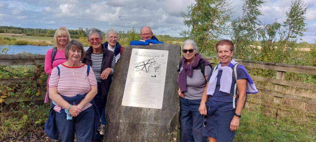Friday walking group at Scorton Lakes information board